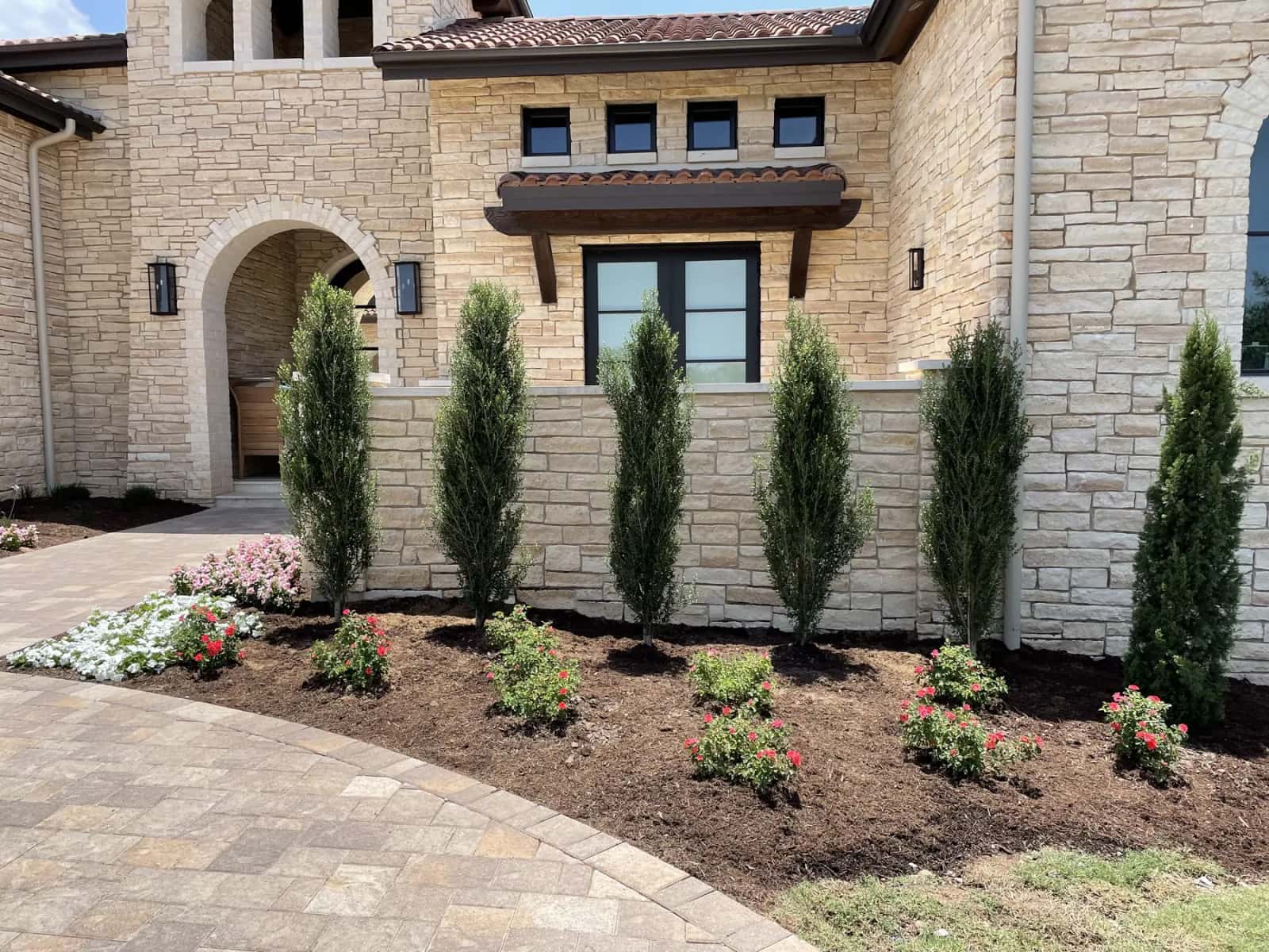 Austin garden path with layered climate-adapted planting